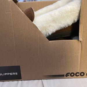 foco women’s  logo moccasin slippers (Carolina Panthers) fits sizes 9-10 tan